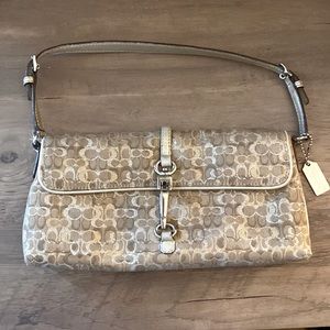 Authentic COACH metallic clutch